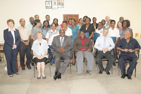Participants and facilitators of the Intensive Coaching Program along with Chief Education Officer Olato Sam (seated second at left) and Coordinator of the Guyana Improving Teacher Education Project Tota Mangar (seated at right).
