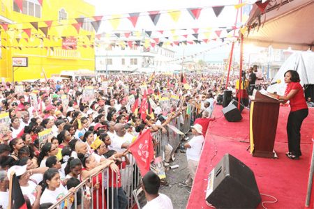 The crowd at the PPP rally at the Kitty Market Square yesterday being addressed by Africo Selman. (Arian Browne photo)