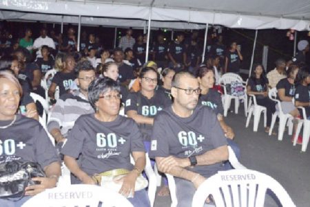 Minister of Natural Resources and the Environment Robert Persaud (right in front row) among the gathering at the WWF and other partners’, Earth Hour 2015 observance at the National Park (GINA photo)