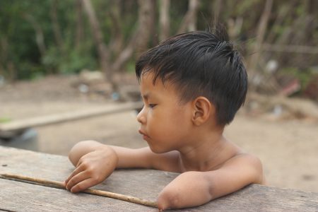 This Amerindian boy was born with only one hand, but this does not stop him from enjoying the outdoors. 
