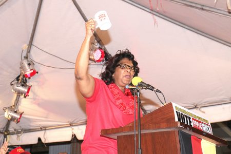 PPP/C Prime Ministerial candidate Elisabeth Harper holding up the PPP’s symbol at this afternoon’s rally in Kitty.