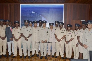 Police Commissioner Seelall Persaud (centre) with officers of the Guyana Police Force High Command (GINA photo)