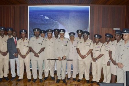 Police Commissioner Seelall Persaud (centre) with officers of the Guyana Police Force High Command (GINA photo)