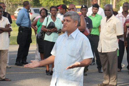 Justice For All Party executive Jaipaul Sharma speaking to those gathered at Parade Ground yesterday in solidarity with slain political activist Courtney Crum-Ewing.