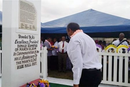 Minister of  Culture Youth and Sport Dr Frank Anthony lays a wreath at the Rosehall Martyrs' monument site (GINA photo)