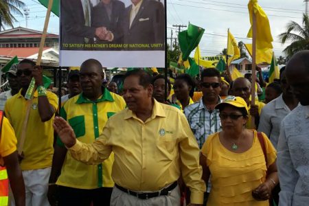 APNU+AFC Prime Ministerial candidate Moses Nagamootoo (centre) and his wife Sita in a march at Whim today for the Alliance's rally this afternoon.