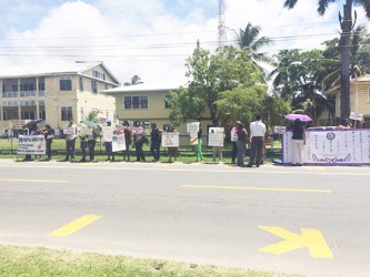 Protestors with placards 