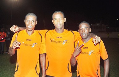 Slingerz FC goal scorers (from left to right) Anthony Abrams, Julian Wade and Devon Millington are all smiles after clinching their berth in the finale of the Kashif and Shanghai tourney following their semi-final win over Riddim Squad 