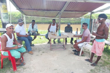 Boatmen gather for a drink 