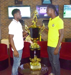  SHOWDOWN! Bakewell Slingerz Captain Vurlon Mills (left) and Alpha United skipper Gregory ‘Jackie Chan’ Richardson face off  at yesterday’s Press Conference.  