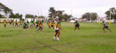 The National Rugby squad going through their paces yesterday at the National Park playfield.