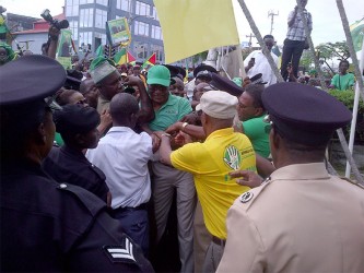 Granger in danger? There was a struggle to bring APNU+AFC presidential candidate David Granger into the compound of City Hall.