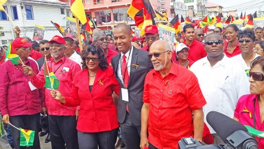 President Donald Ramotar (second from right) leading his team to City Hall yesterday.