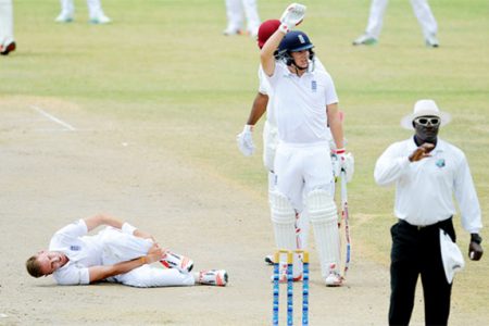 Stuart Broad grabs his ankle on the first day of the two-day, tour match between St. Kitts Invitational XI and English XI yesterday at Warner Park in St. Kitts.  Photo by WICB Media/Randy Brooks of Brooks Latouche Photography
