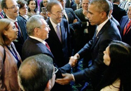 Presidents Obama and Castro shake hands at the Panama summit yesterday (Photo: NPR News)