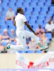 Jerome Taylor celebrates the wicket of Jonathan Trott (not in picture). (Photos WICB media)