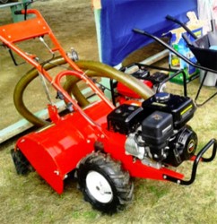 One of the gasoline-powered tillers that was given to the communities