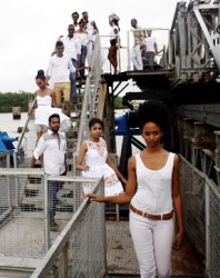  Models crossing the Demerara Harbour Bridge