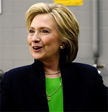 Former Secretary of State Hillary Clinton at an auto shop as she starts her campaign for the 2016 Democratic presidential nomination in Monticello, Iowa, April 14, 2015. (Reuters/Rick Wilking)
