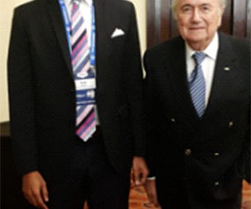 Clinton Urling and FIFA president Sepp Blatter at the congress