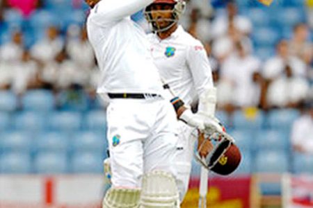 Marlon Samuels celebrates reaching his seventh test ton on day   two of the second Test between  the West Indies  and  England at Grenada National Cricket Stadium, St. George’s, Grenada  yesterday. 
Photo by WICB Media/Randy Brooks of Brooks Latouche Photography
