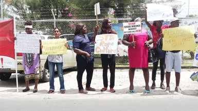 Sherlina Nageer (second from left) at the protest yesterday outside the Ministry of Health over remarks made against her on Monday by Minister of Health Dr Bheri Ramsaran. 