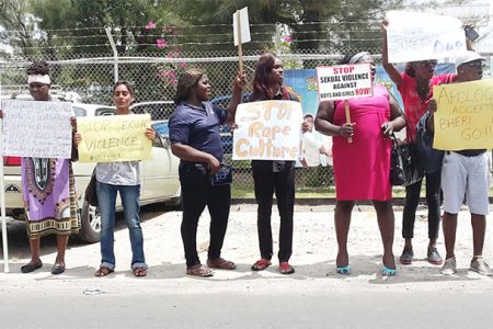Sherlina Nageer (second from left) at the protest yesterday outside the Ministry of Health over remarks made against her on Monday by Minister of Health Dr Bheri Ramsaran.
