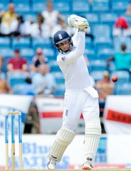 Joe Root who finished unbeaten on 182, drives Jason Holder  on day four of the second Test West Indies v England at Grenada National Cricket Stadium, St. George’s, Grenada yesterday.   Photo by WICB Media/Randy Brooks of Brooks Latouche Photography 