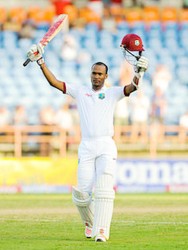 Kraigg Brathwaite celebrates his 100 on day four of the second Test West Indies v England at Grenada National Cricket Stadium, St. George’s, Grenada yesterday.  Photo by WICB Media/Randy Brooks of Brooks Latouche Photography 