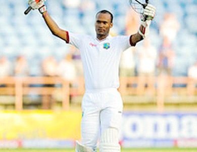 Kraigg Brathwaite celebrates his 100 on day four of the second Test West Indies v England at Grenada National Cricket Stadium, St. George’s, Grenada yesterday.
 Photo by WICB Media/Randy Brooks of Brooks Latouche Photography
