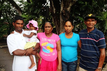 From right: Dhanraj Nagassar, his daughter Asha Nagassar, his wife Savitri Nagassar, his granddaughter Anisa Bissoon and his son Vishal Nagassar. 