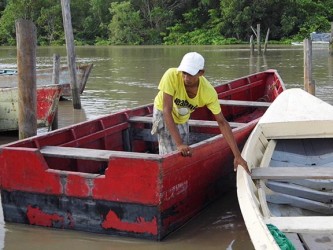 Docking the fishing boat in preparation to load it for a fishing trip. (Photo by Jannelle Williams)