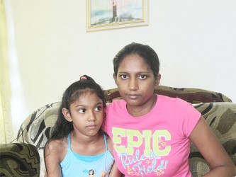 Teresa Lalltoo and her eight-year-old daughter Anuja 
