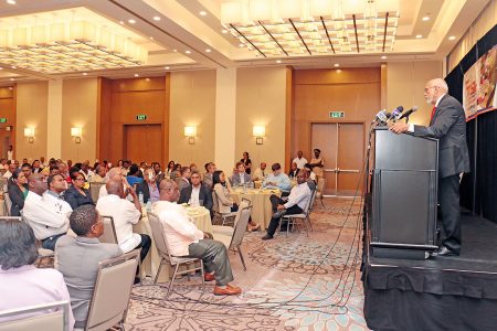 President Donald Ramotar addressing  a Guyana Manufacturing and Services Association  lunch at the Marriott Hotel today.