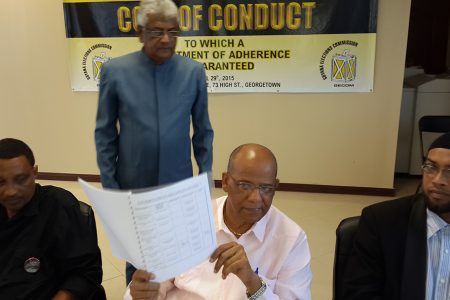 PPP’s General Secretary Clement Rohee (centre) attended the signing although the document was already signed by President Donald Ramotar for the PPP earlier today at the Office of the President. 