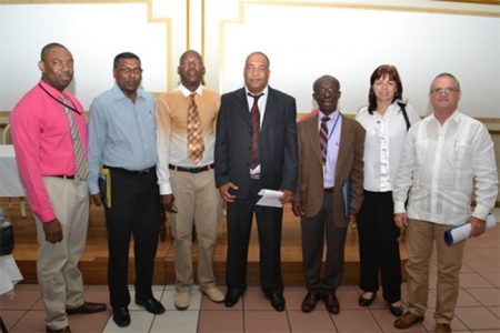 Chief Medical Officer (CMO) Dr. Shamdeo Persaud (second from left) and Cuban Ambassador to Guyana, Dr. Julio Marchante (right) along with other diplomats and course facilitators (GINA photo)