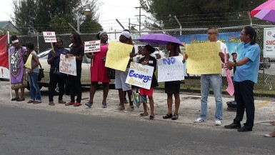 Some of the protesters yesterday in front of the Ministry of Health in support of Sherlina Nageer who was verbally abused by Health Minister Dr Bheri Ramsaran on Monday.  