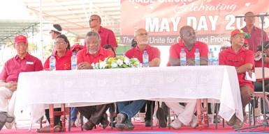 (From left to right) PPP General Secretary Clement Rohee, PPP/C Prime Ministerial candidate Elisabeth Harper, Prime Minister Sam Hinds, President Donald Ramotar, FITUG’s President Carvil Duncan and GAWU’s President Komal Chand at FITUG’s Labour Day rally, held at the National Park yesterday. (Arian Browne photo)