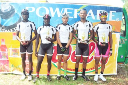 Winner’s row! Team Evolution cyclists (from right to left) Michael Anthony, Marlon Williams, Raul Leal, Orville Hinds and Akeem Wilkinson. (Orlando Charles photo)
