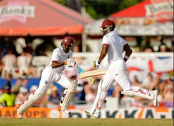 Jermaine Blackwood and Darren Bravo during their 108-run fifth-wicket partnership on day three of the third and final Test West Indies  against England at Kensington Oval, Bridgetown, Barbados yesterday. Photo by WICB Media/Randy Brooks of Brooks Latouche Photography 