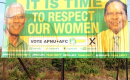 The defaced APNU+AFC Coalition billboard