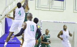 Action between Guyana (green) and Suriname (white) in the third match of their international basketball series contested at Ismay Van Wilgen Sports Hall in Paramaribo.