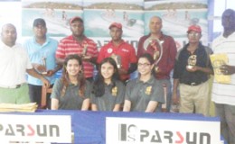 Club President David Mohamad (standing left) posing with the respective winners (from left to right) in Crown Mining Supplies Golf tournament inclusive of Kalyan Tiwari, Mahendra Bhagwandin, Avinash Persaud, Patanjalee Persaud, Bholawram Deo and Guy Griffith. Seated are the three daughters of Patanjalee Persaud.