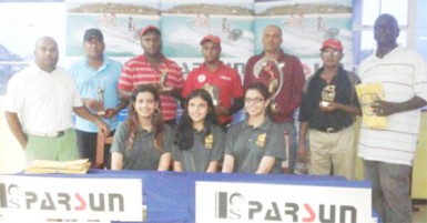 Club President David Mohamad (standing left) posing with the respective winners (from left to right) in Crown Mining Supplies Golf tournament inclusive of Kalyan Tiwari, Mahendra Bhagwandin, Avinash Persaud, Patanjalee Persaud, Bholawram Deo and Guy Griffith. Seated are the three daughters of Patanjalee Persaud.