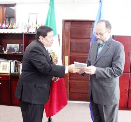 Ivan Roberto Sierra –Medel (left) and Caricom Secretary General Irwin LaRocque (Caricom photo)