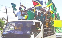 A truck load of supporters who were part of an APNU+AFC motorcade that started from New Amsterdam and moved to Skeldon, in Berbice last evening to celebrate the coalition’s win at the general elections.
