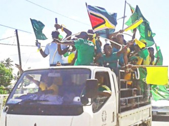 A truck load of supporters who were part of an APNU+AFC motorcade that started from New Amsterdam and moved to Skeldon, in Berbice last evening to celebrate the coalition’s win at the general elections.  