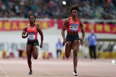 BEESSING IN SURPRISE! Nigeria’s Blessing Okagbare-Ighoteguonor (R) upsets Jamaica’s Shelly-Ann Fraser-Pryce during the women’s 100m race at the IAAF Diamond League Athletics in Shanghai yesterday.REUTERS/ALY SONG 