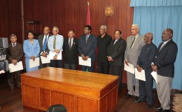 New ministers sworn in yesterday: From left are Jaipaul Sharma, who is Junior Finance Minister; Valerie Garrido-Lowe, who is Junior Indigenous Peoples’ Affairs Minister; Raphael Trotman, Minister of Governance; Dominic Gaskin, Minister of Business; Sydney Allicock, Indigenous Peoples’ Affairs Minister; Khemraj Ramjattan, Second Vice-President and National Security Minister; President David Granger; Prime Minister and First Vice-President Moses Nagamootoo; Noel Holder, Minister of Agriculture; Keith Scott, Junior Minister of Infrastructure; and Winston Felix, Minister of Citizenship.
