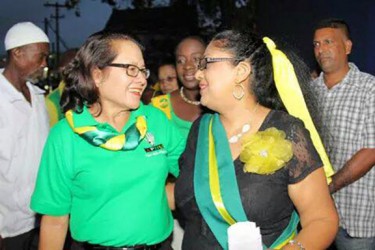 On the campaign trail First Lady Sandra Granger (left) and wife of the PM Sita Nagamootoo share a moment